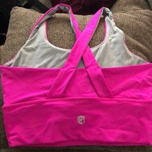 Hot pink sports bra/crop top.